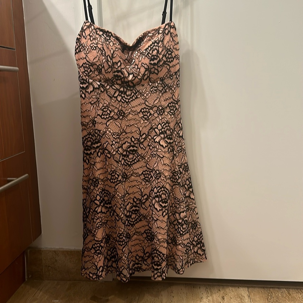 Short pink and black lace dress